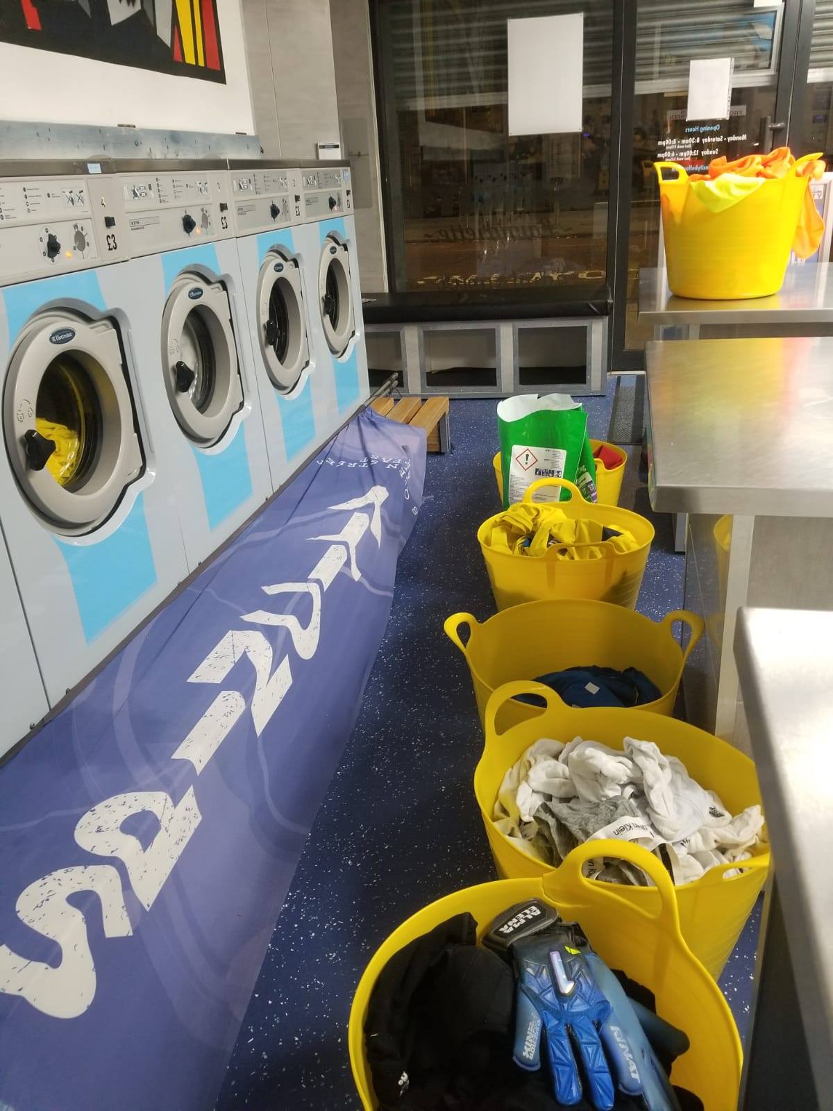 Clean clothes in buckets